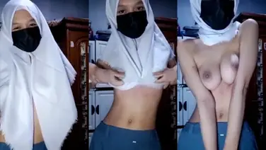 Nina Asanti Jilbab Seragam Batik Aksi Ranjang poster
